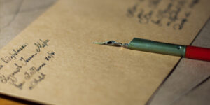 pen sitting on a envelope